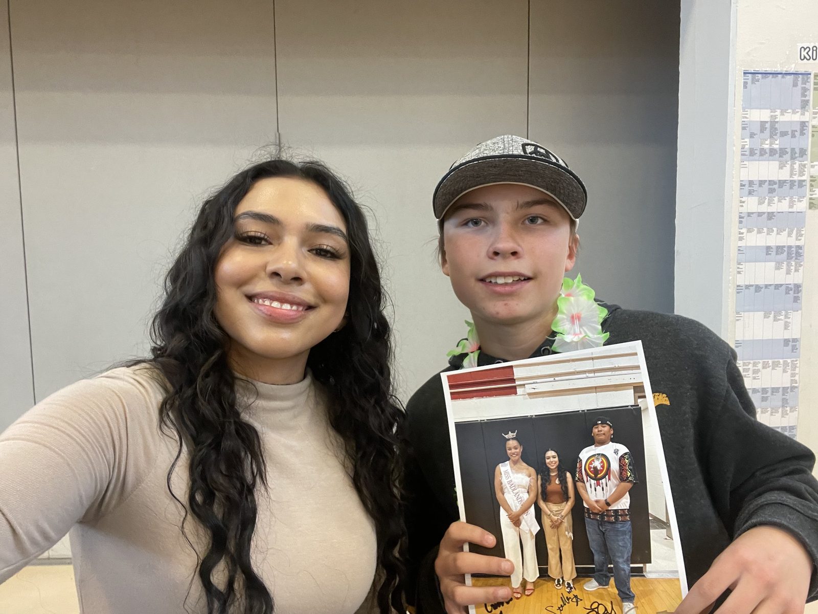 Stella Standingbear posing with supporters