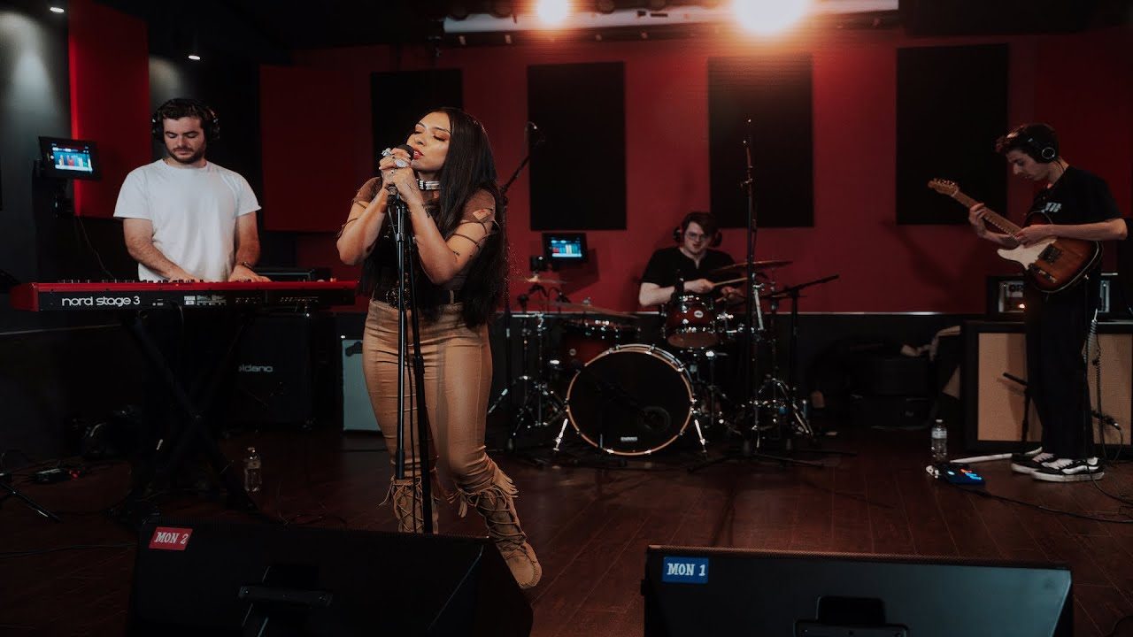 Stella Standingbear performing Home Runs with a live band