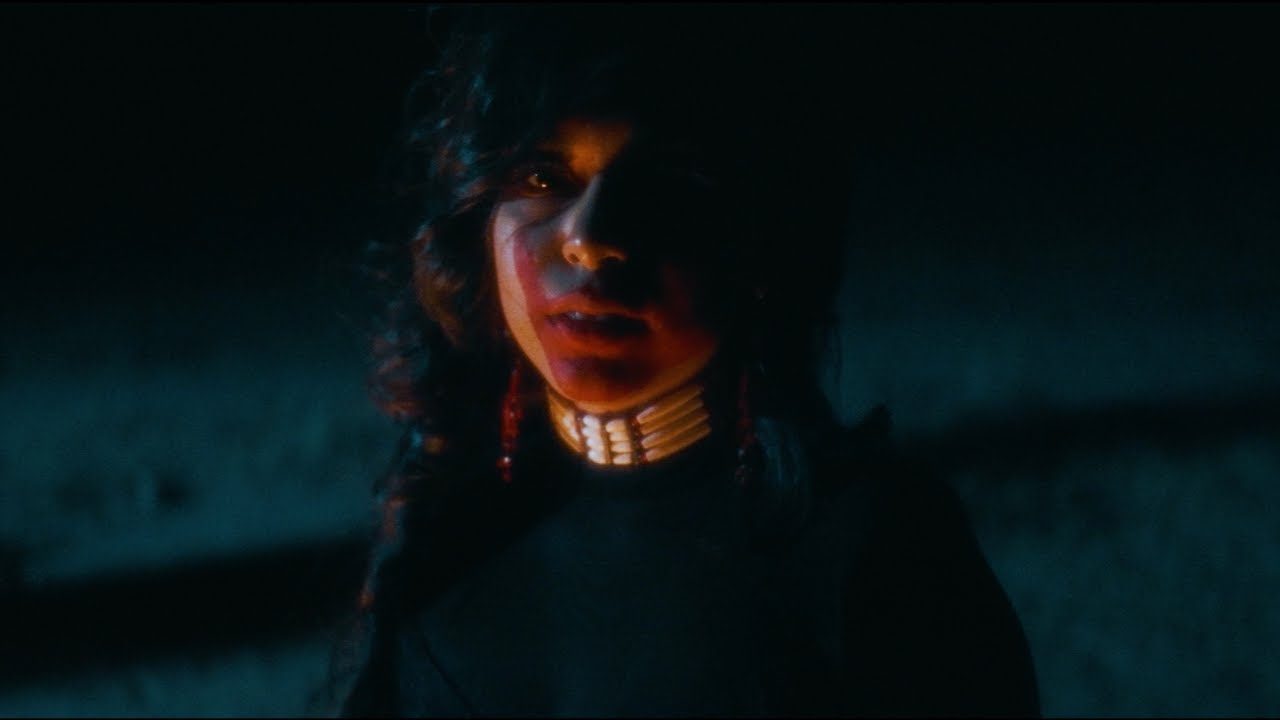 Still from the official music video for Home Runs