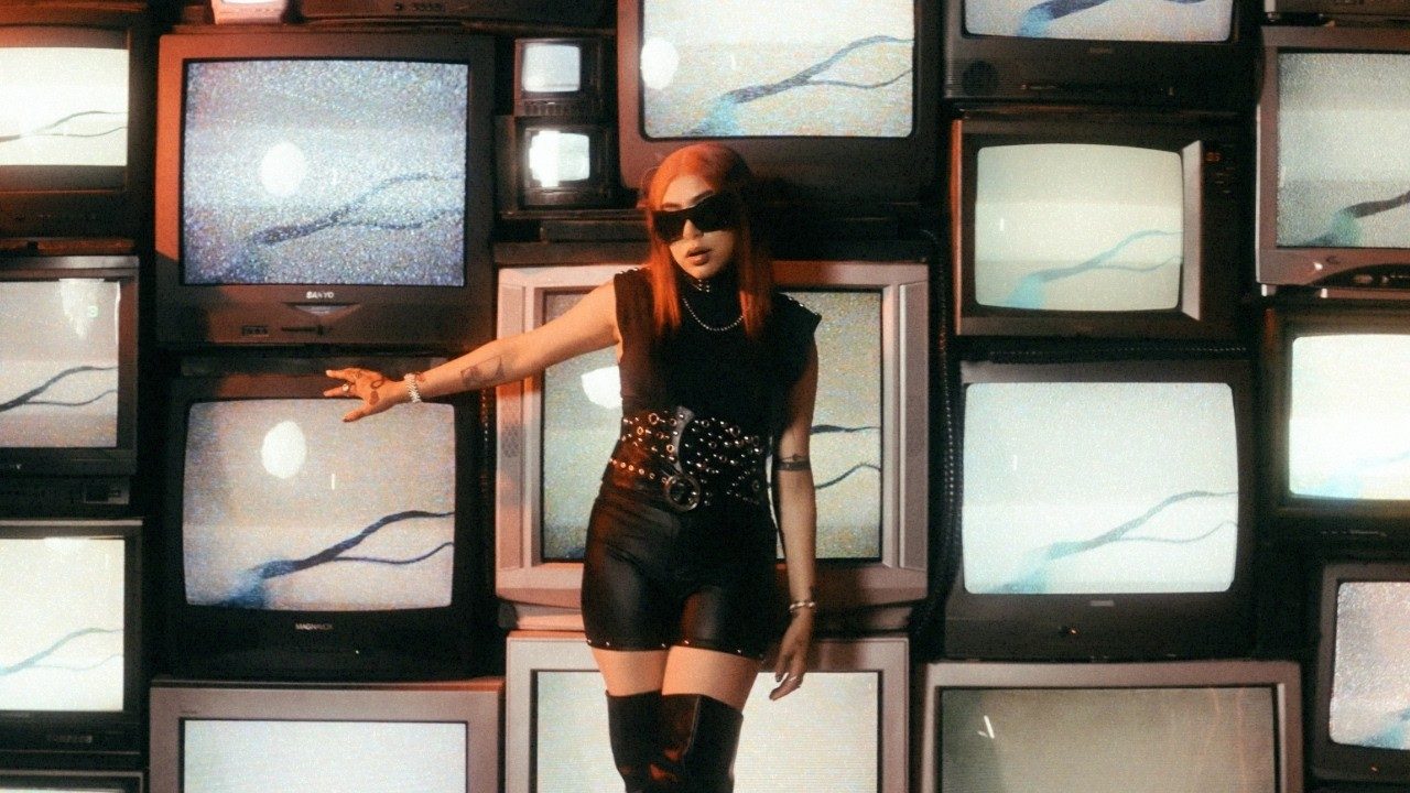 Still from the official music video for Mmhmm Remix featuring Paul Wall
