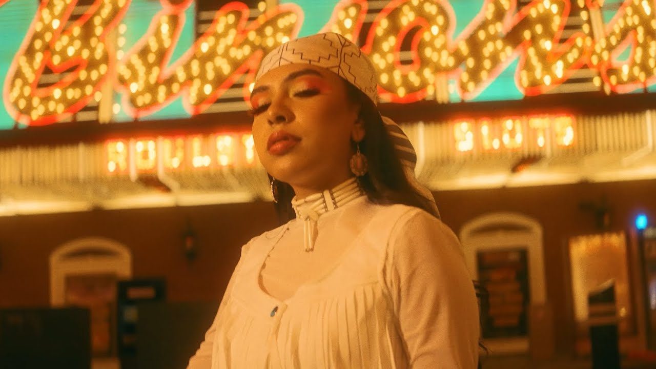 Still from the official music video for Paradise