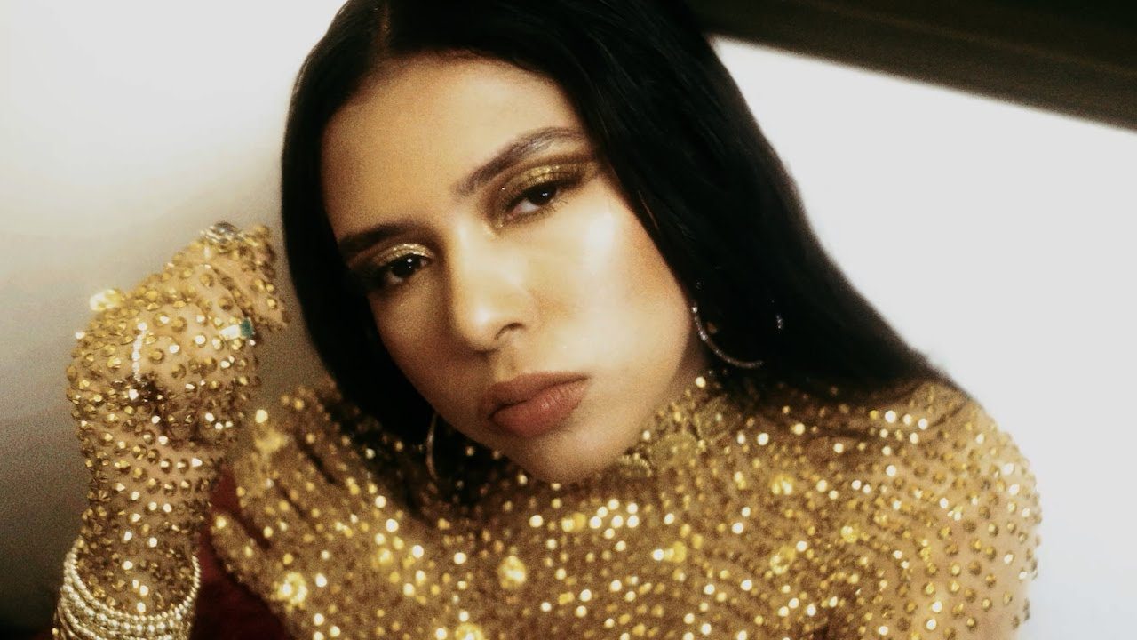 Still from the official music video for So In Love